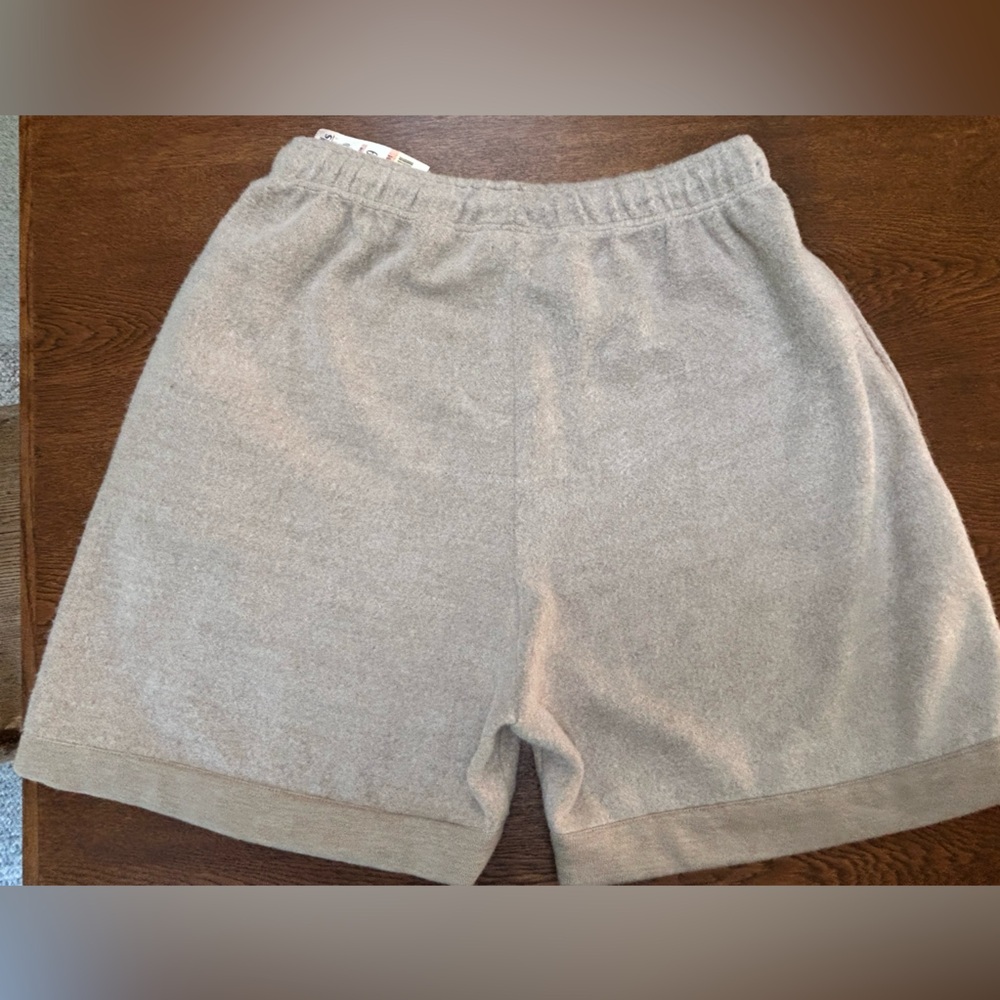 Express Athletique Med Brushed Poly-cotton outer. Soft tan jersey lined & cuff.